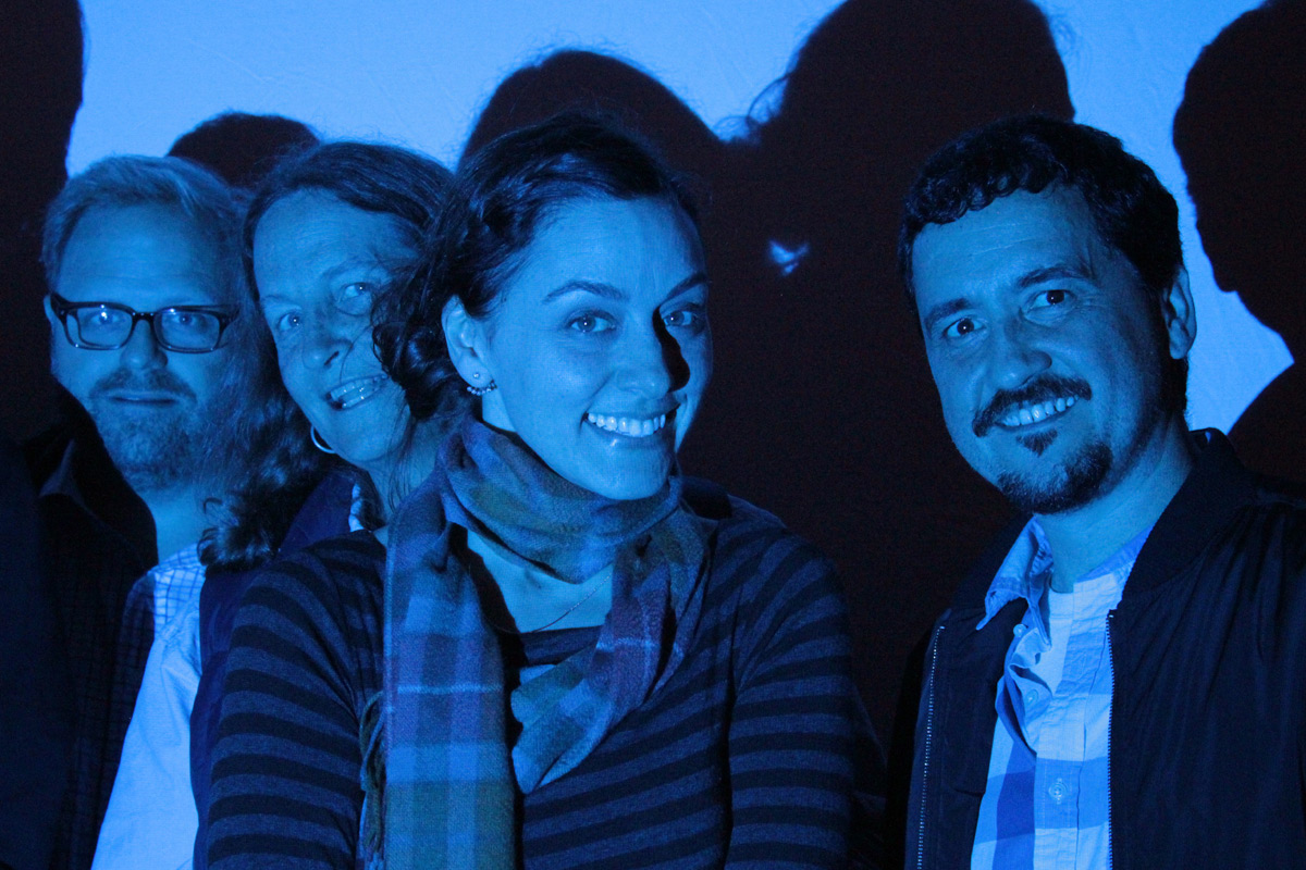 film makers and friends in front of the blue screen